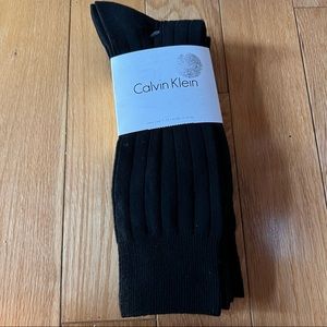 Men's Calvin Klein socks 4 pair black size 7-12 ribbed pattern NWT
